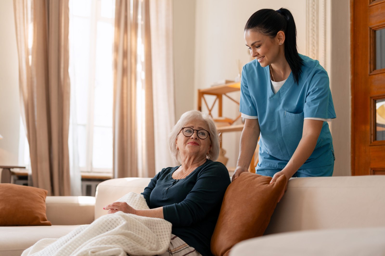 Nurse consulting with elderly couple